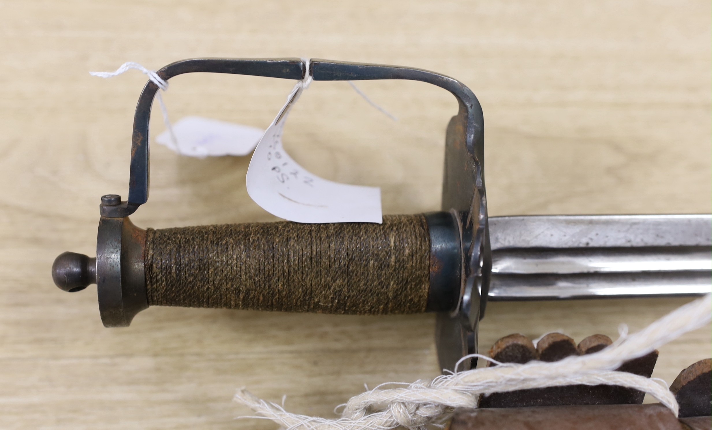 A Cromwellian style sword with leather scabbard and belt